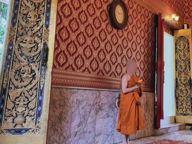 “The new monk receives his alms bowl and silk material”